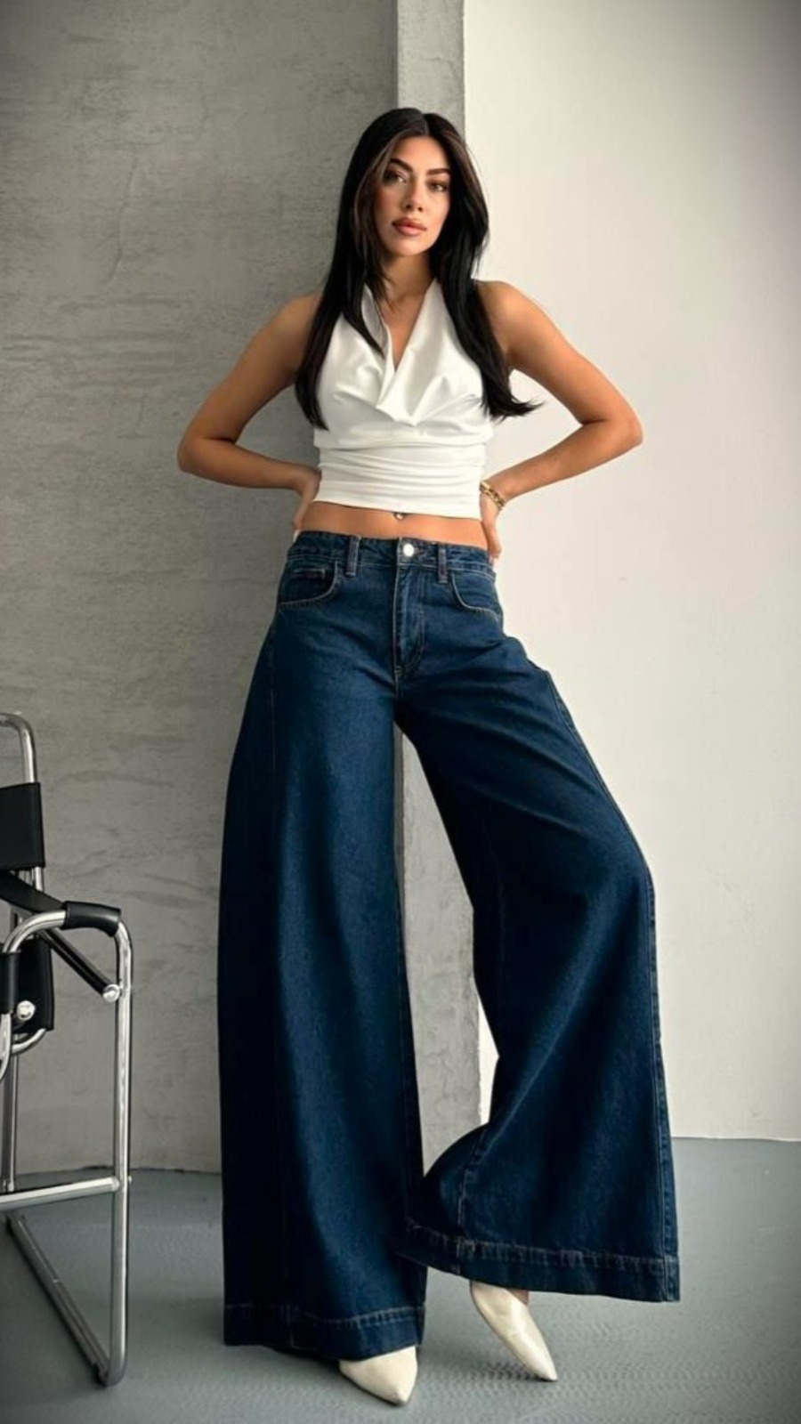 White halter top styled with wide-leg denim from Rhyme & Hype